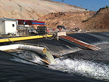 Electronic leak detection used to protect a tailings pond in the mining industry